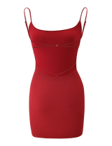 The MINERVA MINI DRESS by TIGERMIST is a sleeveless, form-fitting red bodycon dress with thin adjustable straps and subtle strap details on the chest and waist, shown against a white background.