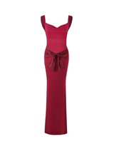 ZITA DRESS - RED : SALSA : DEEP RED by TIGERMIST: A sleeveless maxi dress in deep red, featuring wide straps, a sweetheart neckline, and a satin bow at the waist, displayed on a white background.