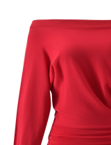 A close-up of the TIGERMIST JANINE MINI DRESS - RED highlights its off-shoulder design, ribbed neckline detail, and draped ruching at one side of the waist.